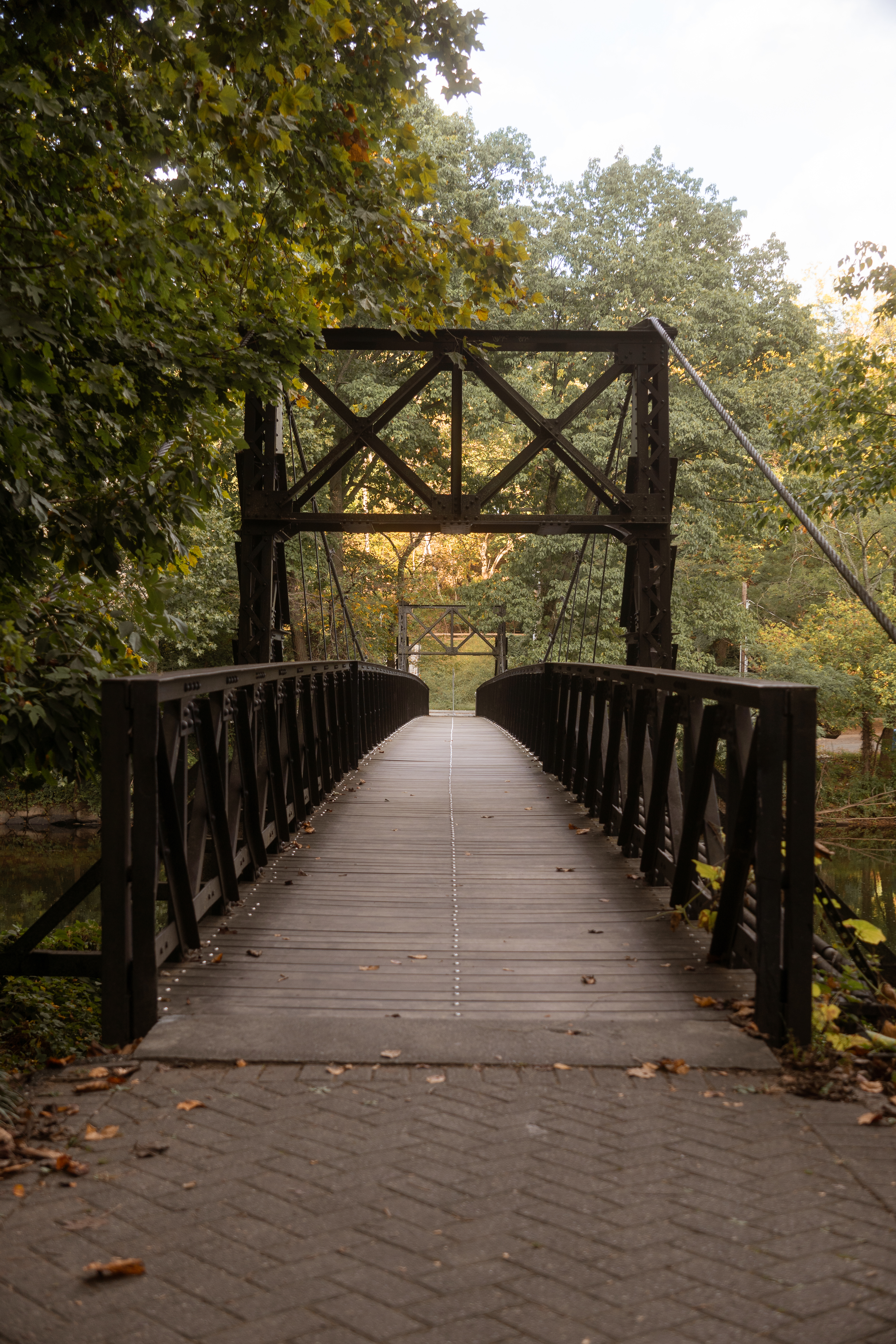 Bridge over water with scenic surroundings in landscape photography setting