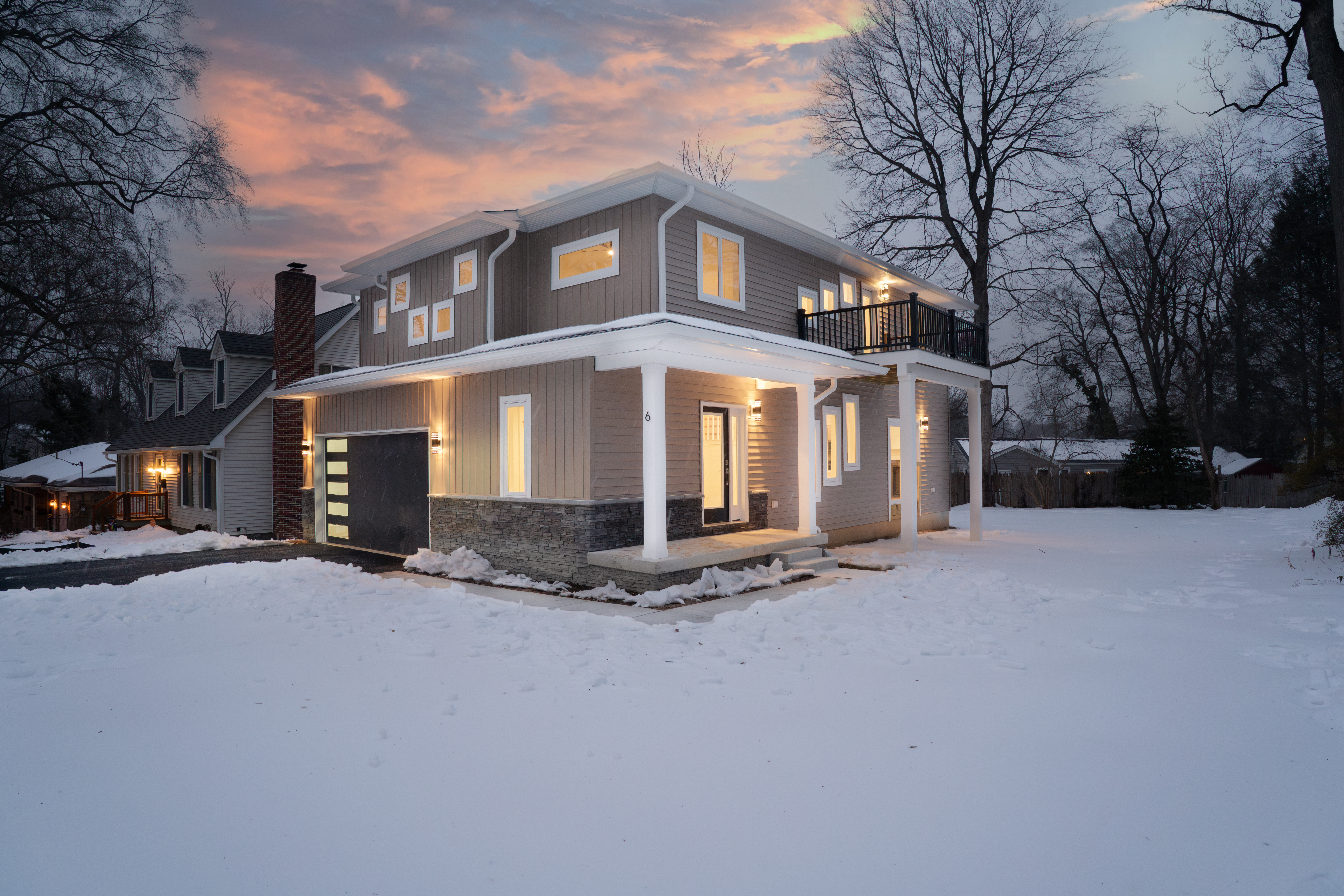 Real estate property with modern architecture and well-manicured landscaping