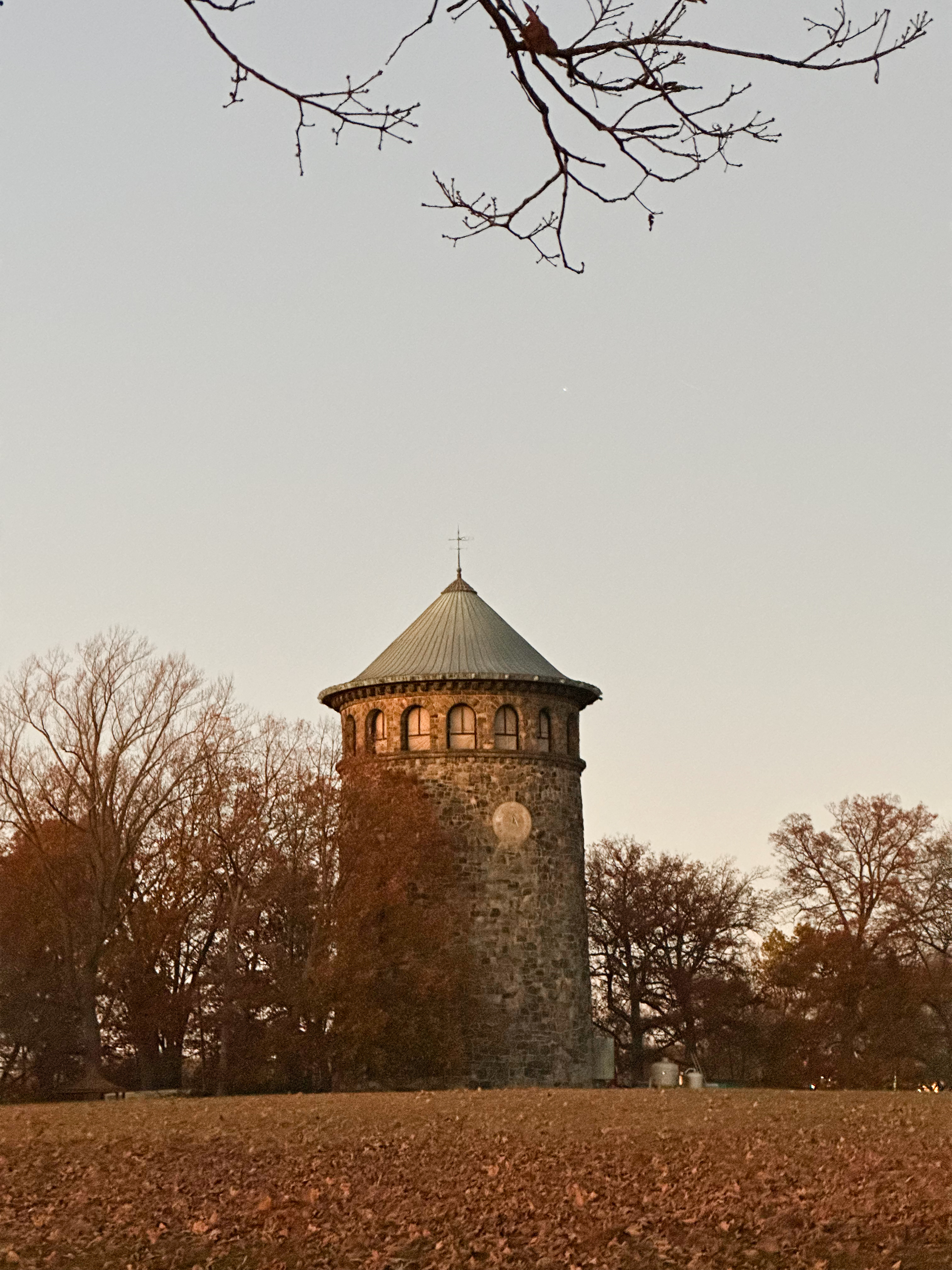 Tower in the distance with dramatic sky and vibrant colors in nature photography setting